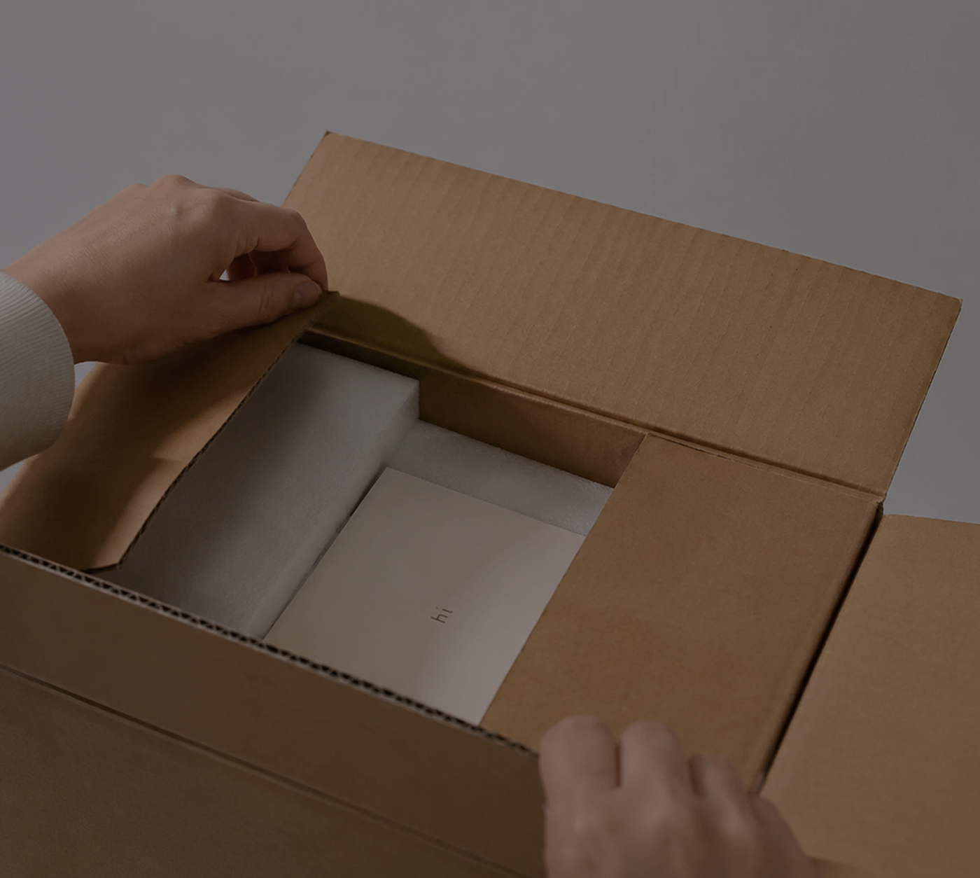 Opening a safely packed art delivery